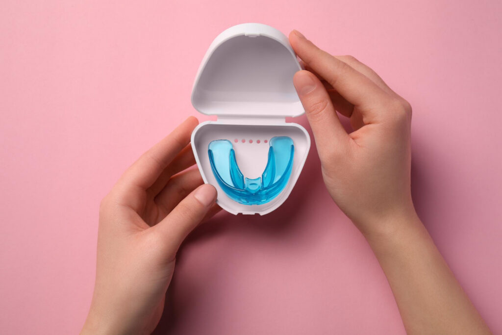 A custom-fitted night guard designed to protect teeth from grinding and clenching.