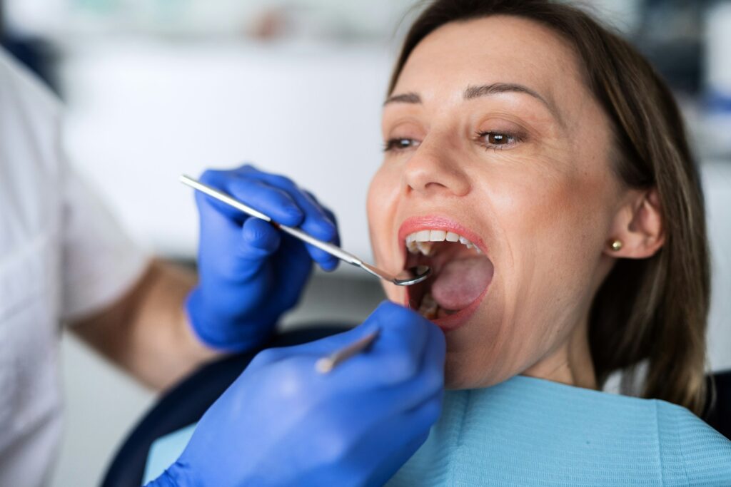 Guide to Choosing Between a Dental Bridge and an Implant